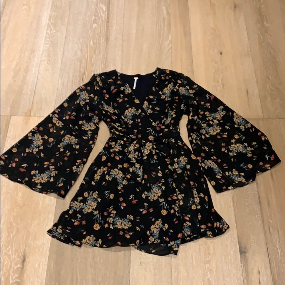 Black long sleeved floral mini dress